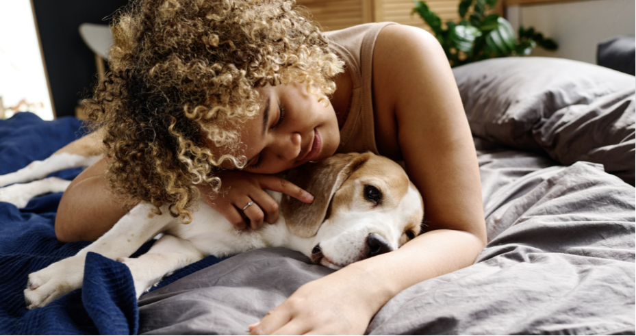 Tenant cuddling with their dog.