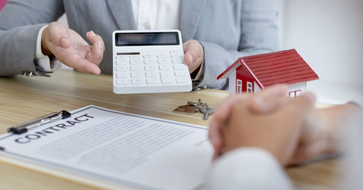 People going over their contract, including how to handle the security deposit.