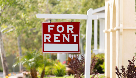 Single-family home with a 'For Rent' sign, ready for accidental landlord rental conversion
